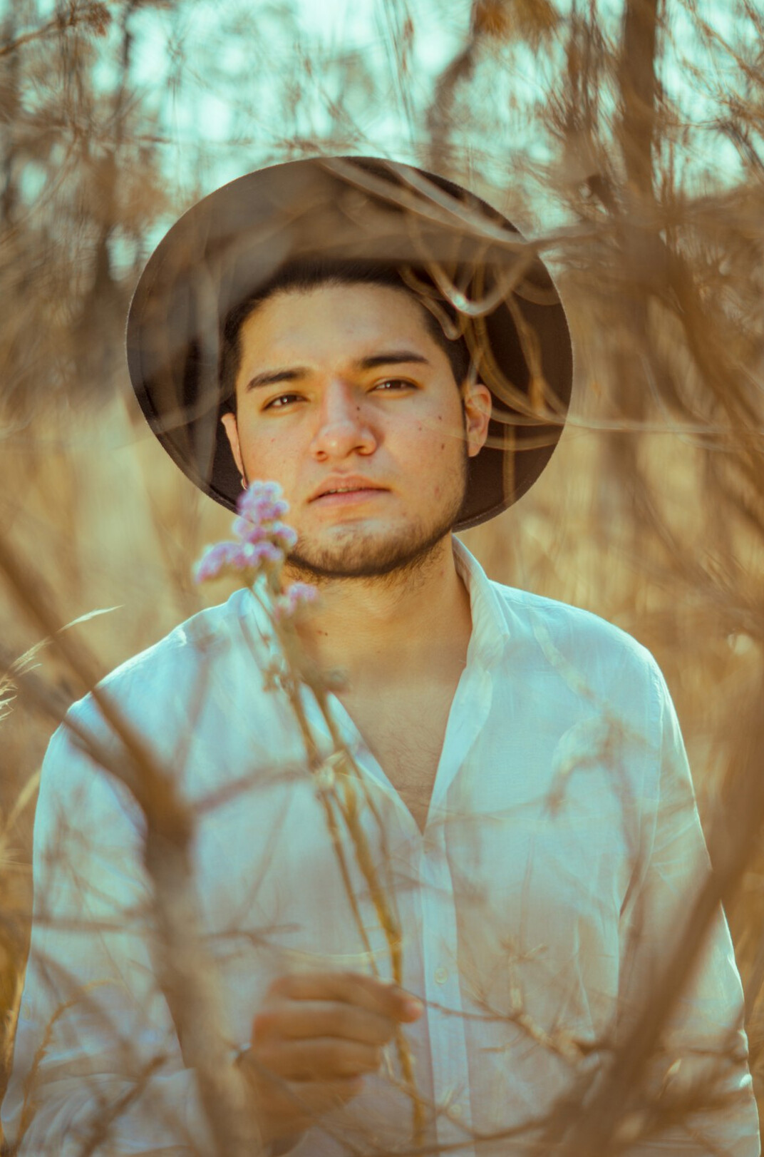 Portrait of a young man in a light shirt